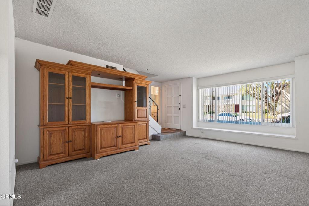 6508 Penn Street, Unit B Moorpark, CA 93021 - Photo 8 of 27 an empty room with windows