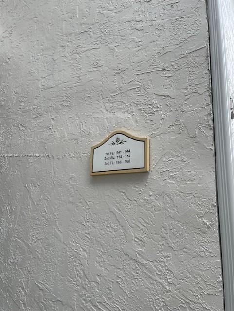 5612 Rock Island Road, Unit 167 Tamarac, FL 33319 - Photo 16 of 16 a view of a brick wall
