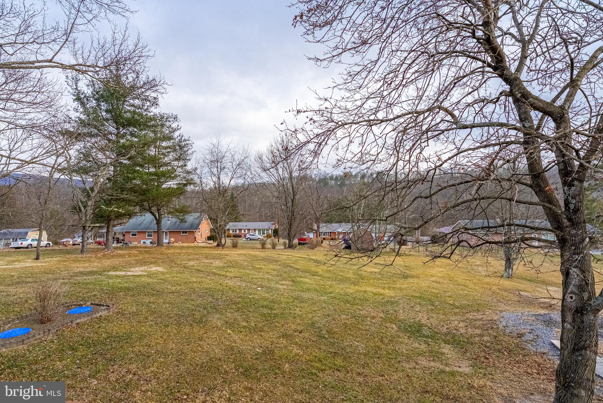 13604 Bedford Road Northeast Cumberland, MD 21502 - Photo 37 of 37 a view of a yard with a large tree