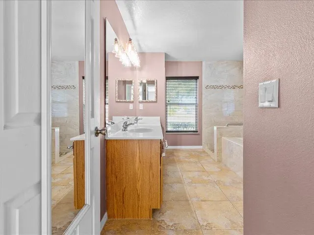 a bathroom with a sink a toilet and a bathtub