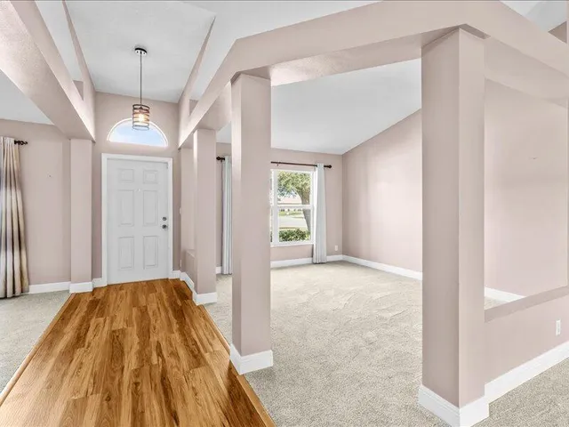 a large spacious bathroom with a large tub and shower