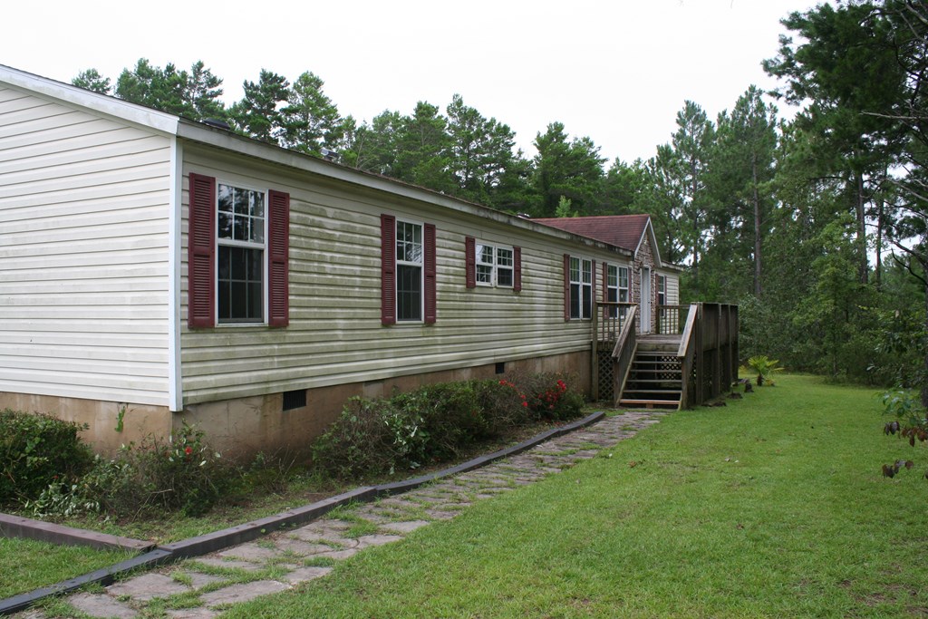 50 Simmons Road Mauk, GA 31058 - Photo 19 of 35 a view of a house with backyard and garden