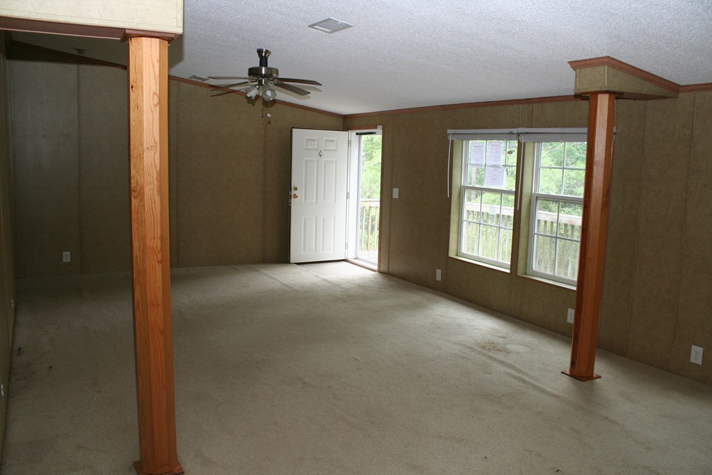50 Simmons Road Mauk, GA 31058 - Photo 27 of 35 a view of a room with a windows and a ceiling fan