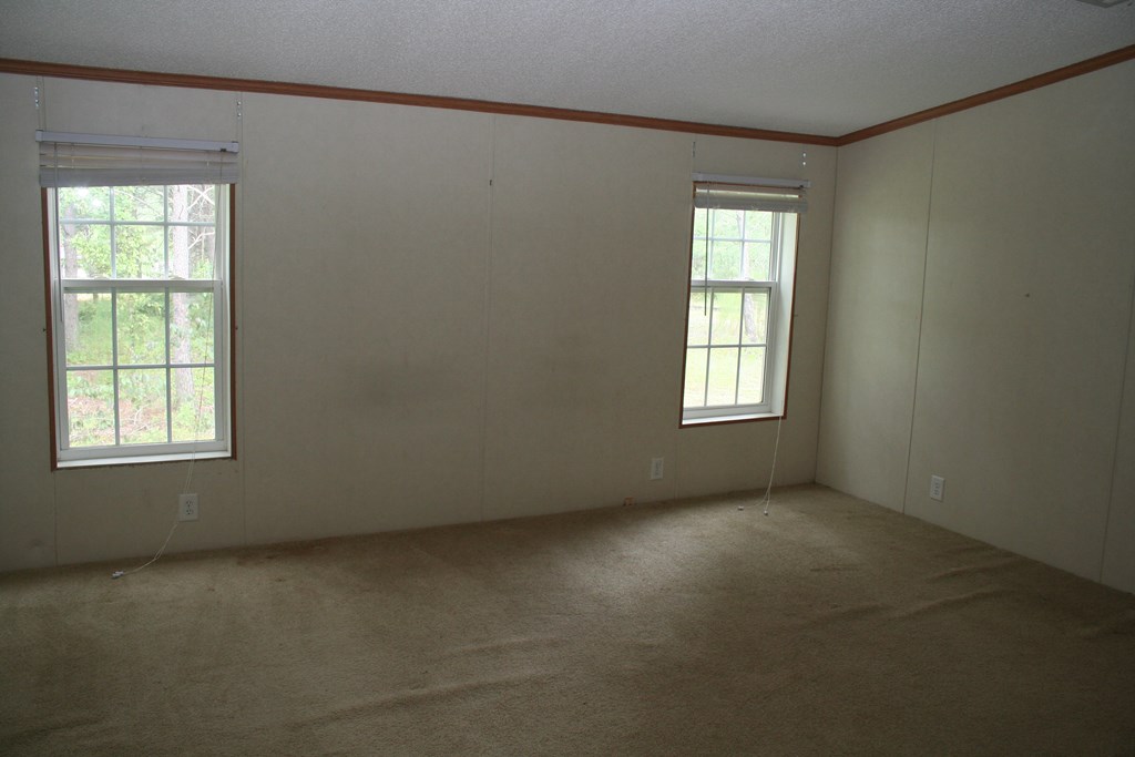 50 Simmons Road Mauk, GA 31058 - Photo 7 of 35 an empty room with windows