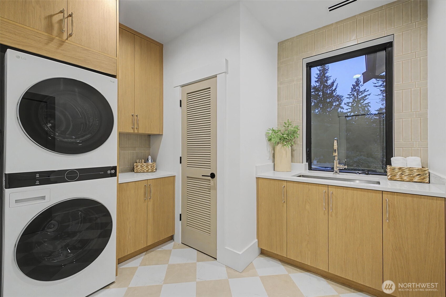 14515 Southeast 20th Place Bellevue, WA 98007 - Photo 15 of 21 a view of a hallway with washer and dryer