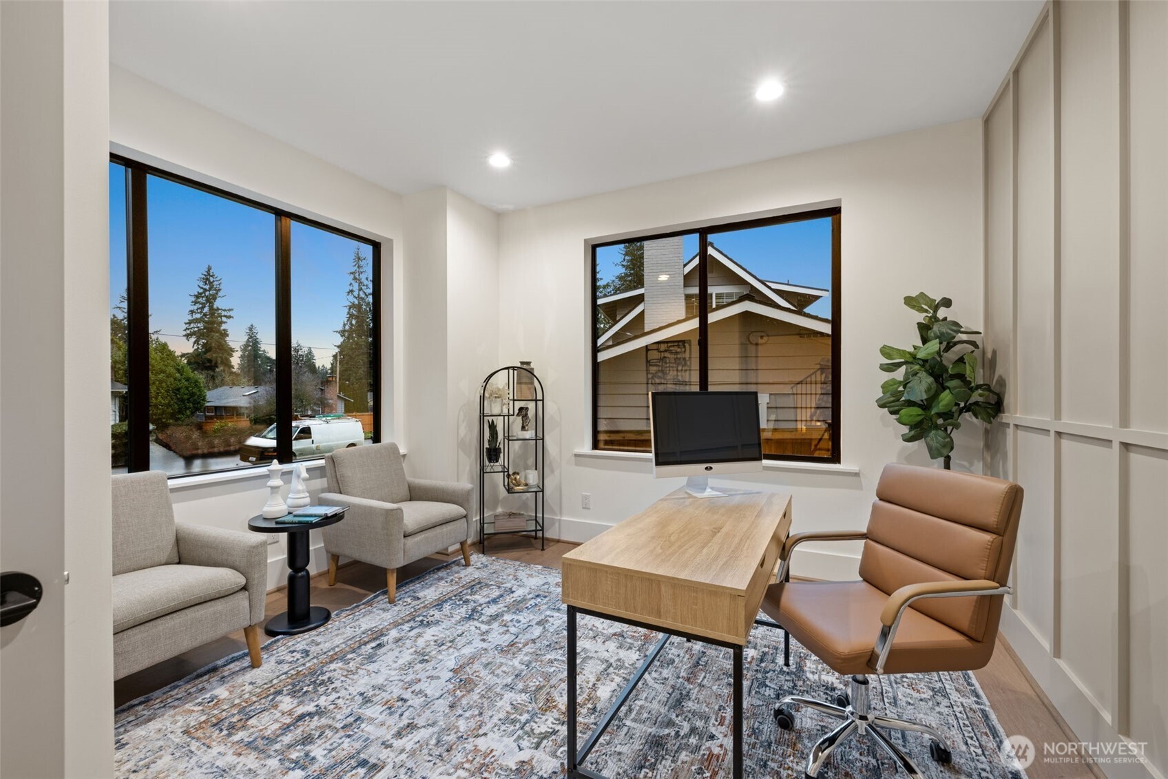 14515 Southeast 20th Place Bellevue, WA 98007 - Photo 9 of 21 a living room with furniture a lamp and a potted plant