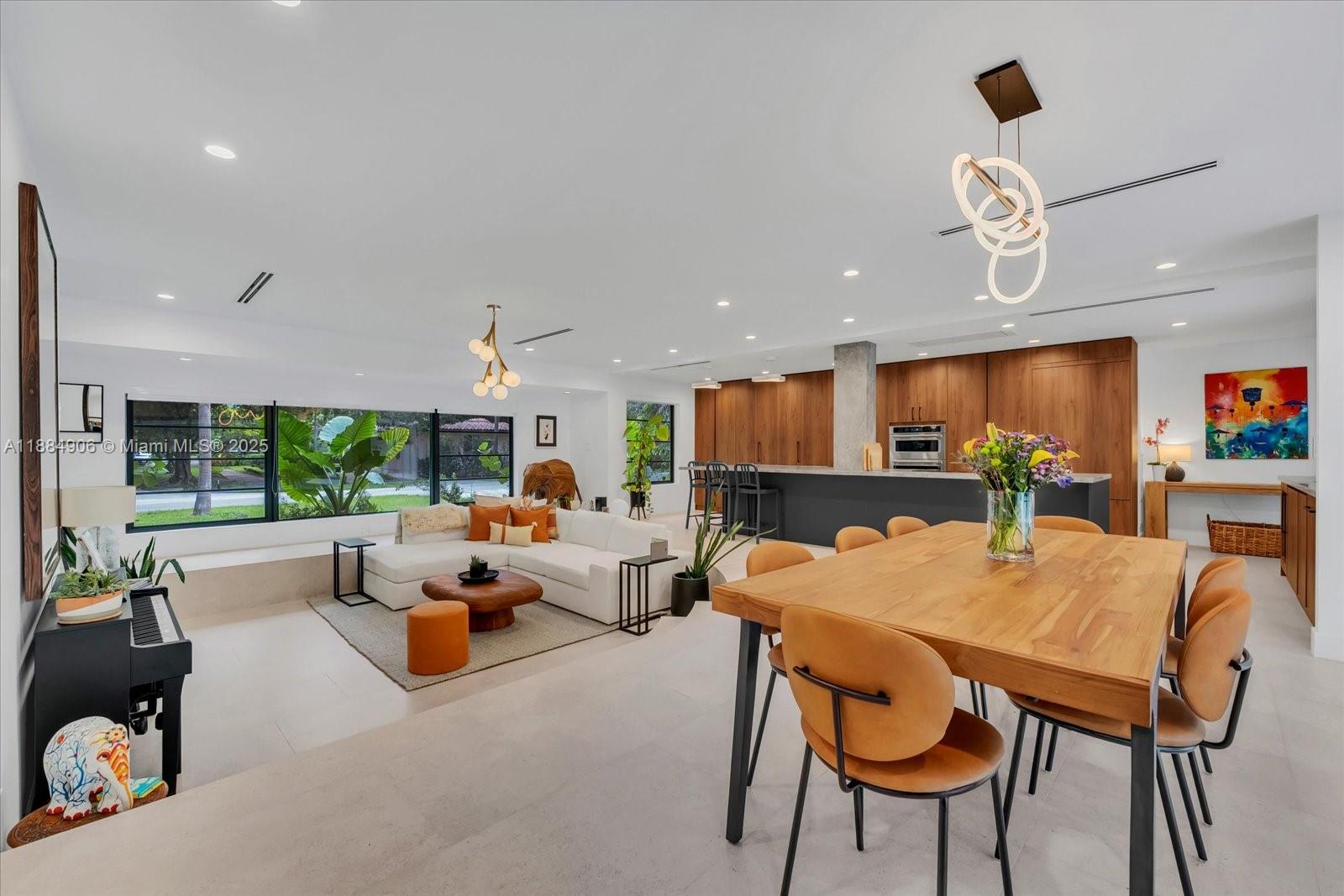 3111 Anderson Road Coral Gables, FL 33134 - Photo 11 of 34 a view of a dining room with furniture window and outside view