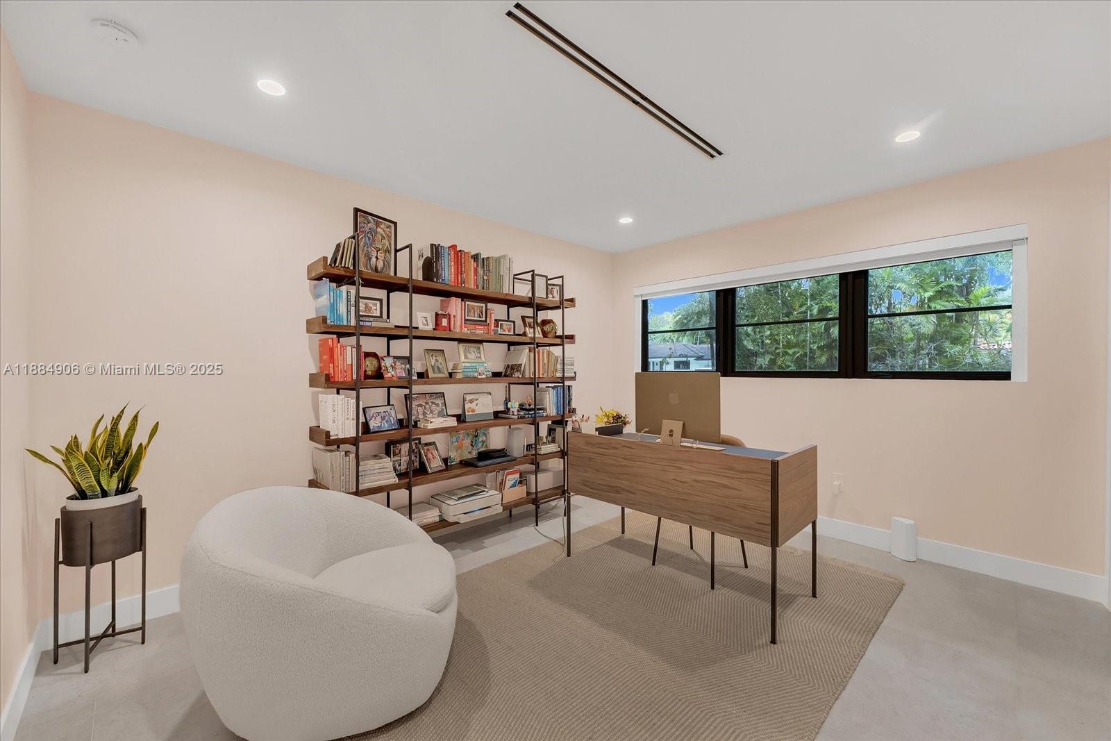 3111 Anderson Road Coral Gables, FL 33134 - Photo 16 of 34 a workspace with furniture and a potted plant