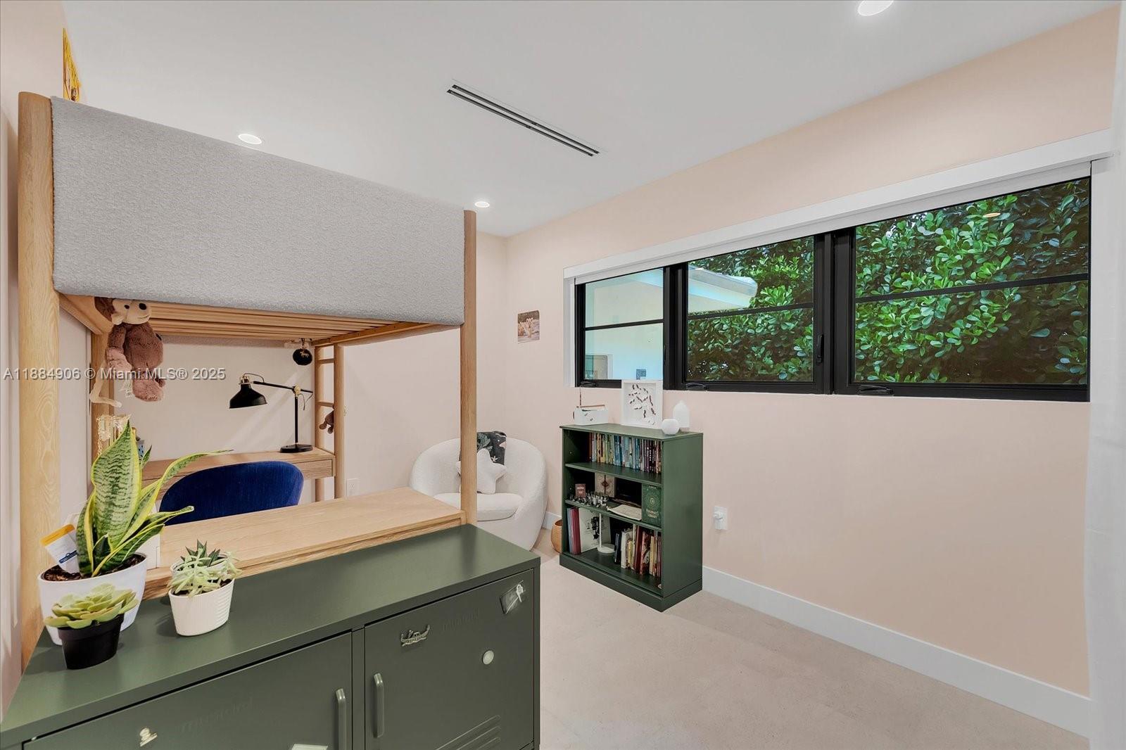 3111 Anderson Road Coral Gables, FL 33134 - Photo 21 of 34 a spacious bathroom with a double vanity sink and a large mirror