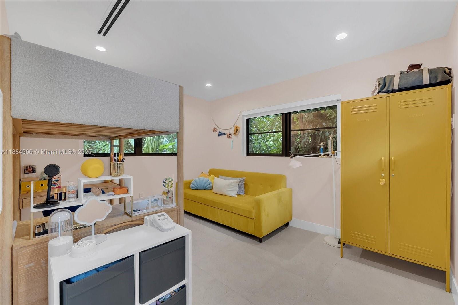 3111 Anderson Road Coral Gables, FL 33134 - Photo 23 of 34 a living room with furniture and a large window