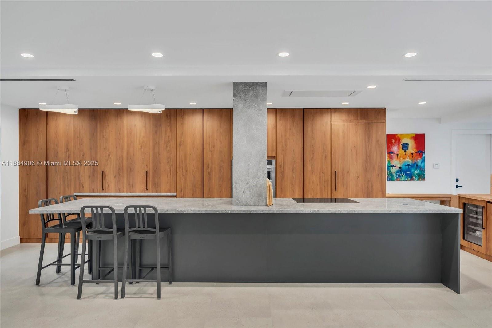 3111 Anderson Road Coral Gables, FL 33134 - Photo 6 of 34 a view of kitchen island with stainless steel appliances granite countertop counter space