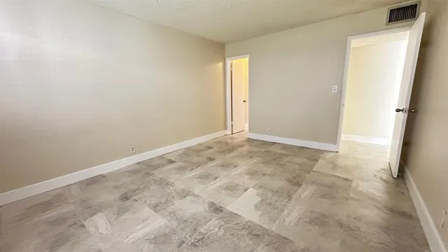 a bathroom with a sink toilet a mirror and shower