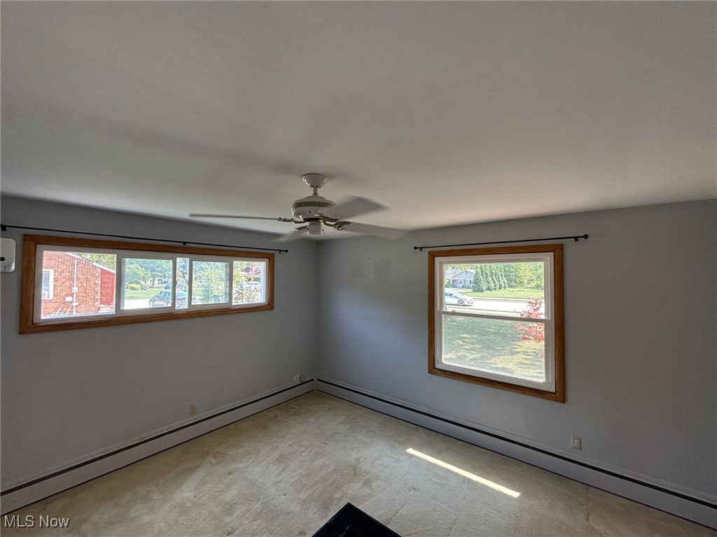 12060 West Sprague Road Parma, OH 44130 - Photo 18 of 30 The master bedroom receives plenty of natural light, and the room has a ceiling fan AND a wall-mounted, ductless air conditioner.