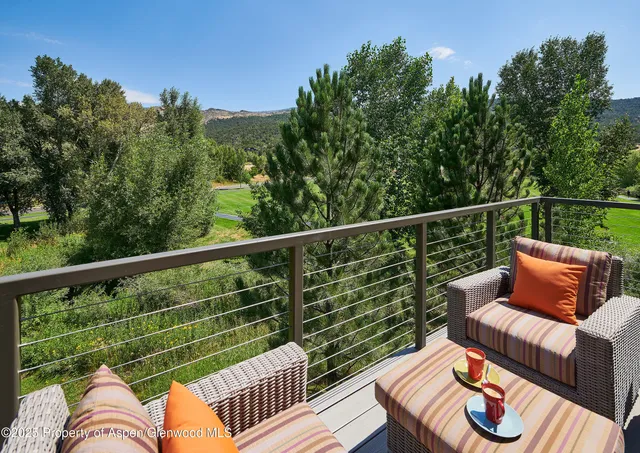 a view of a chair in the roof deck