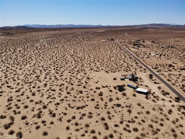 a view of a flat screen tv and a yard