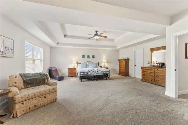a work room with furniture and a window