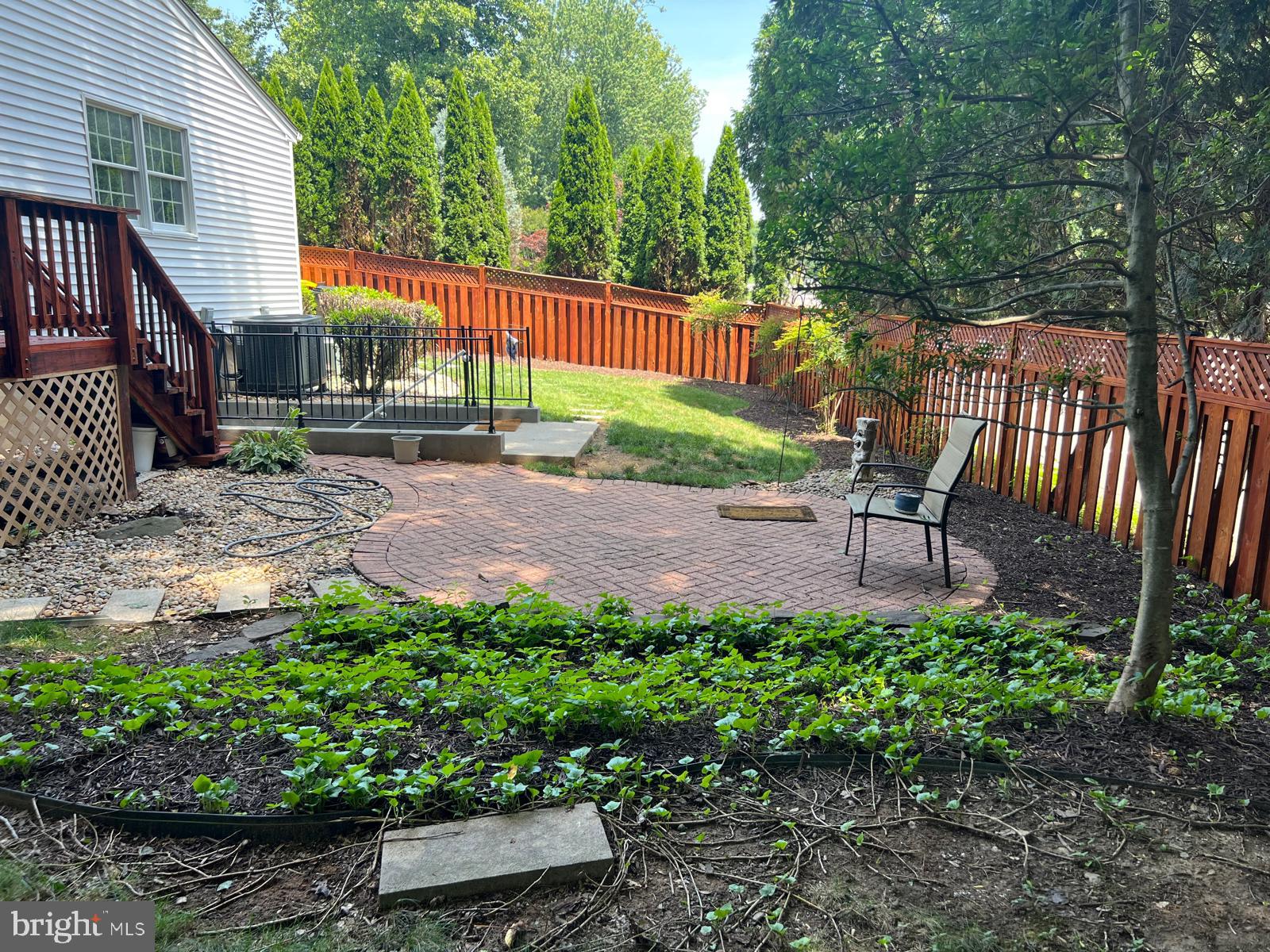 9201 Beachway Lane Springfield, VA 22153 - Photo 8 of 12 Charming backyard retreat with patio.