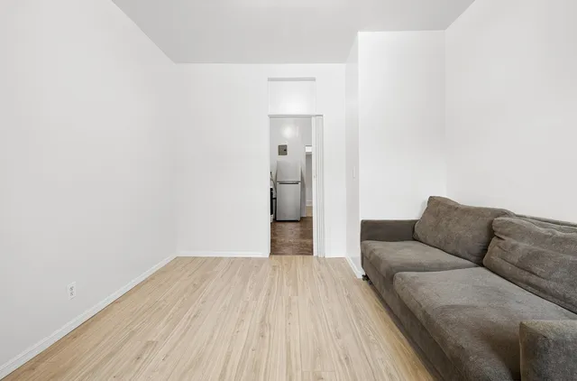 a view of livingroom with furniture and wooden floor
