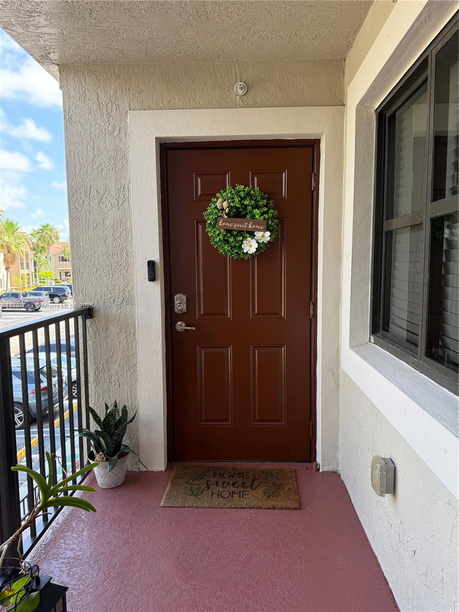 22561 Southwest 88th Place, Unit 2027 Cutler Bay, FL 33190 - Photo 11 of 11 Entry Door