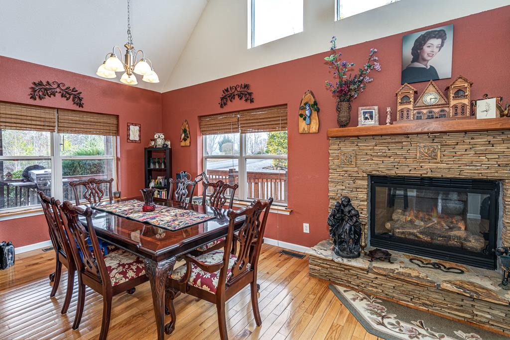 210 Pin Oak Ridge Murphy, NC 28906 - Photo 13 of 51 a view of a dining room with furniture window and outside view