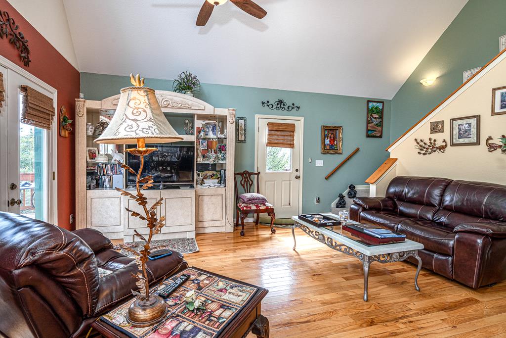 210 Pin Oak Ridge Murphy, NC 28906 - Photo 15 of 51 a living room with furniture a rug and a floor to ceiling window