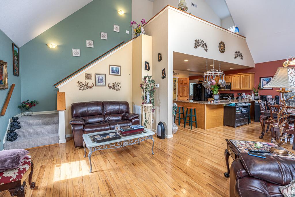 210 Pin Oak Ridge Murphy, NC 28906 - Photo 18 of 51 a kitchen with stainless steel appliances kitchen island granite countertop a sink and cabinets