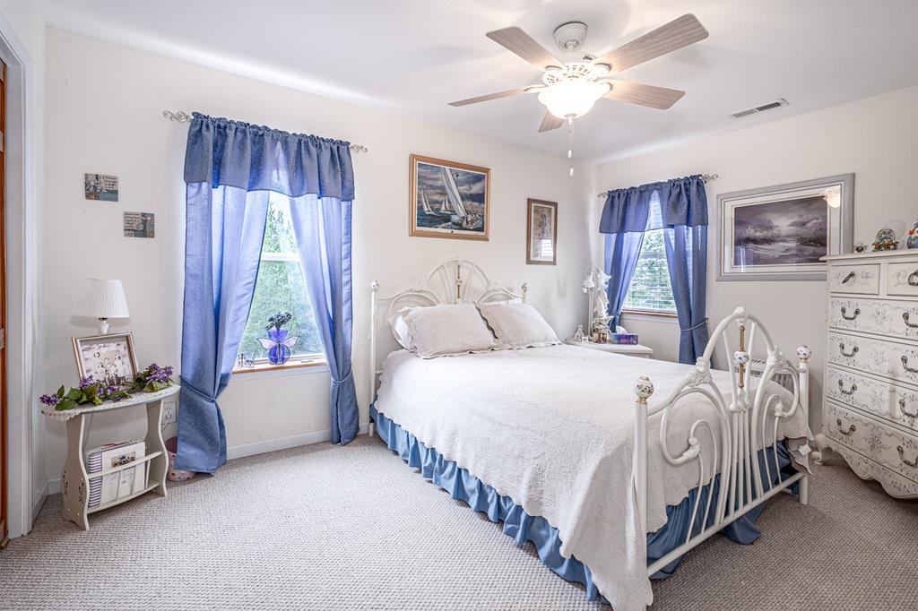 210 Pin Oak Ridge Murphy, NC 28906 - Photo 20 of 51 a bedroom with bed and a window