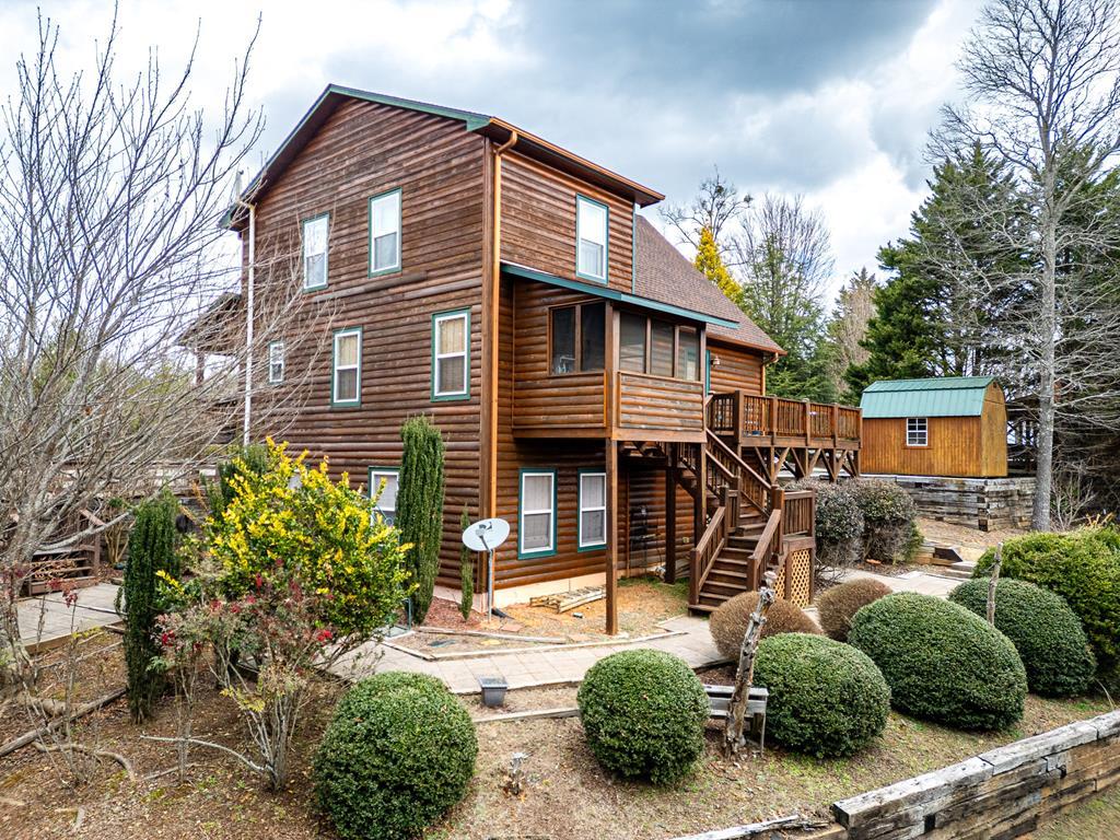 210 Pin Oak Ridge Murphy, NC 28906 - Photo 2 of 51 a front view of a house with a yard