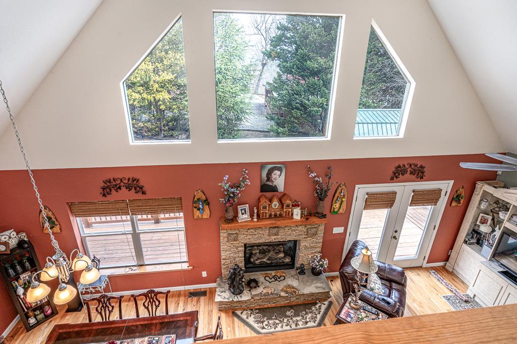 210 Pin Oak Ridge Murphy, NC 28906 - Photo 23 of 51 a living room with furniture and a fireplace