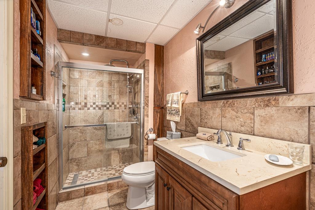 210 Pin Oak Ridge Murphy, NC 28906 - Photo 31 of 51 a bathroom with a sink toilet and shower