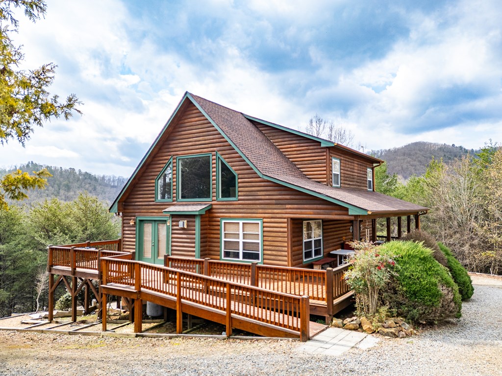 210 Pin Oak Ridge Murphy, NC 28906 - Photo 5 of 51 a front view of a house with a balcony