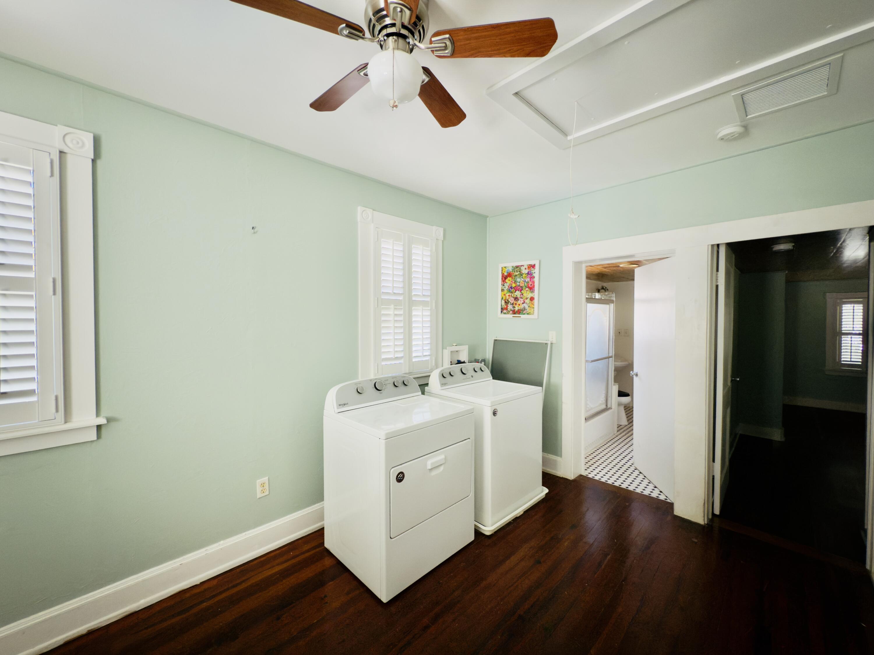 728 Ashe Street Key West, FL 33040 - Photo 12 of 25 a view of room with wooden floor and fan
