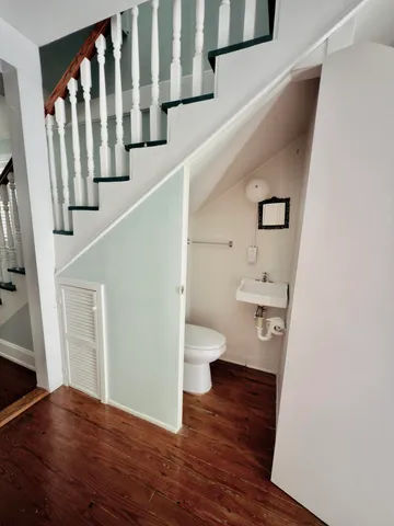 a view of entryway with wooden floor
