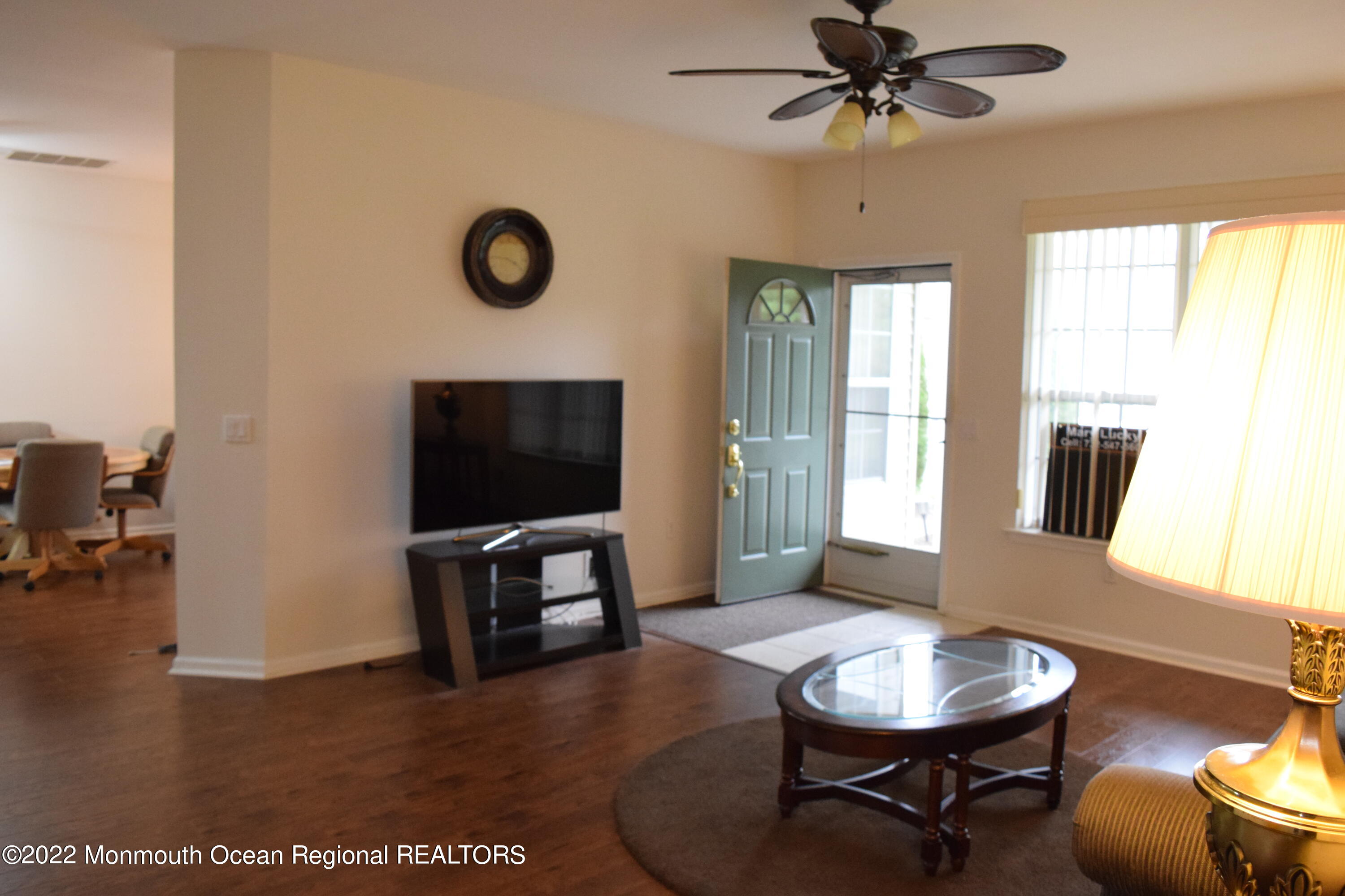 23 Foxwood Road Lakewood, NJ 08701 - Photo 2 of 34 a living room with furniture and a flat screen tv