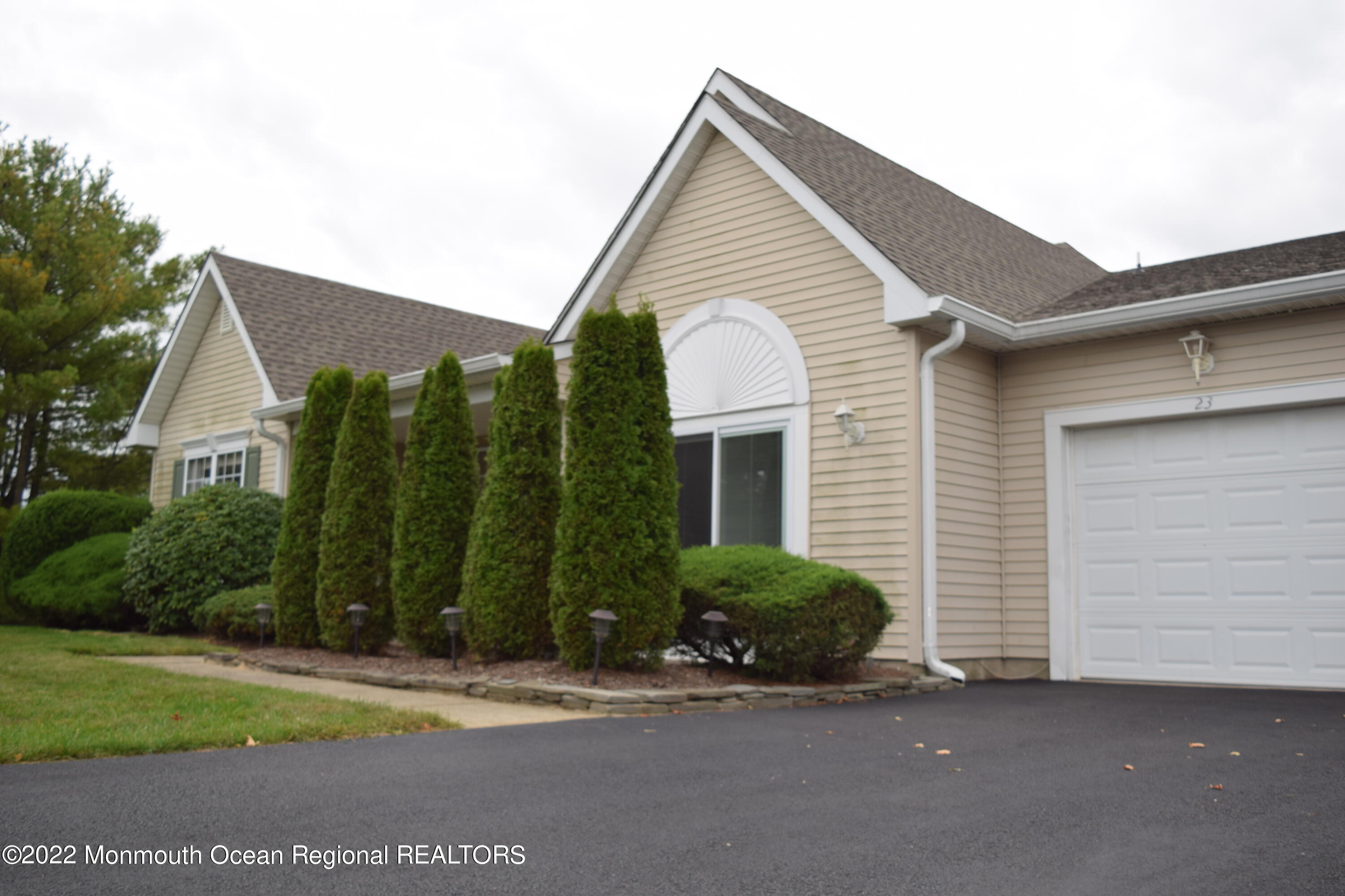 23 Foxwood Road Lakewood, NJ 08701 - Photo 21 of 34 a view of a house and a yard