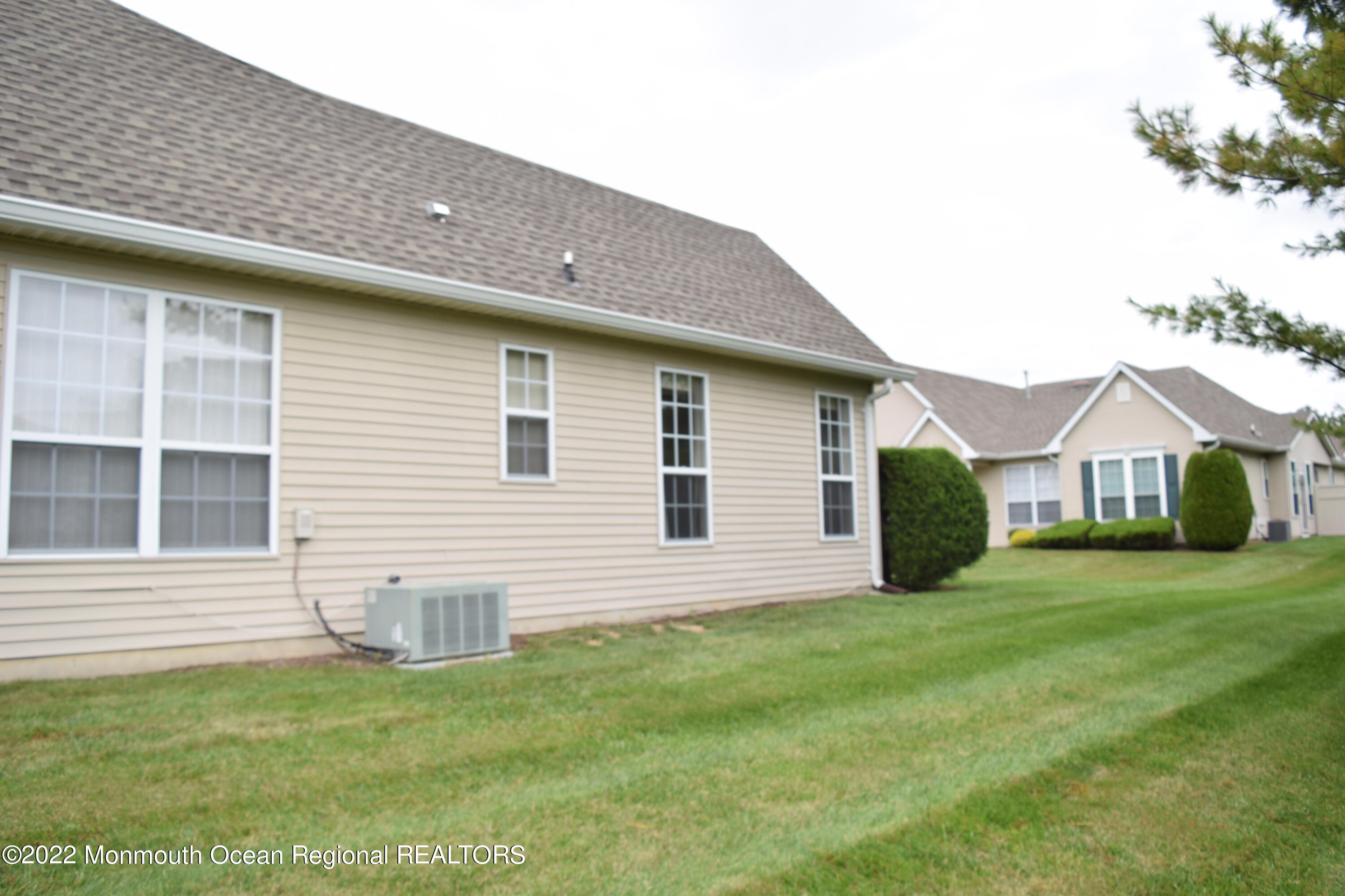 23 Foxwood Road Lakewood, NJ 08701 - Photo 23 of 34 a view of a house with a backyard