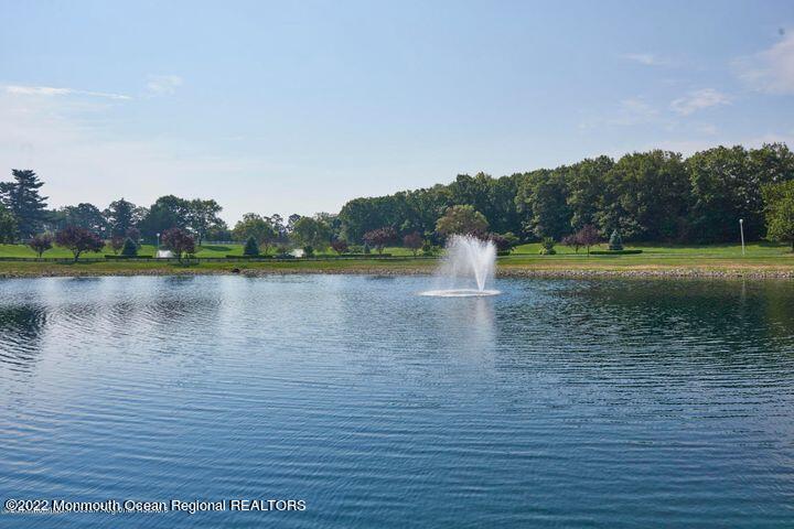 23 Foxwood Road Lakewood, NJ 08701 - Photo 31 of 34 a view of a lake with houses in the back