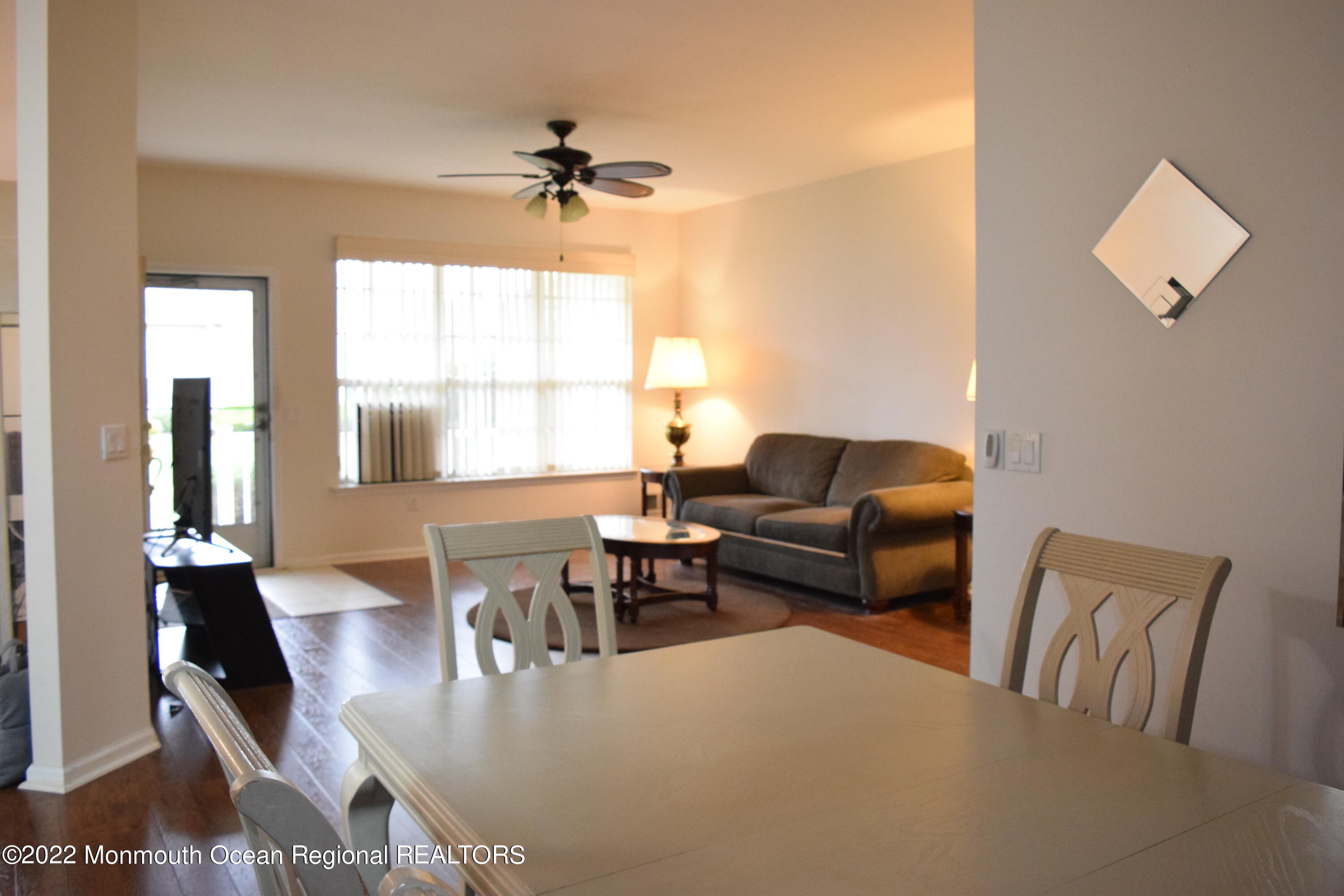 23 Foxwood Road Lakewood, NJ 08701 - Photo 4 of 34 a living room with furniture and a window