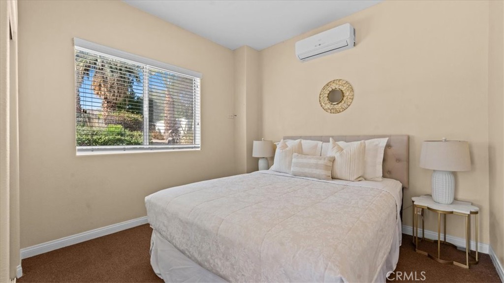 71569 Sahara Road Rancho Mirage, CA 92270 - Photo 28 of 51 5th Bedroom, with split AC system of the back patio