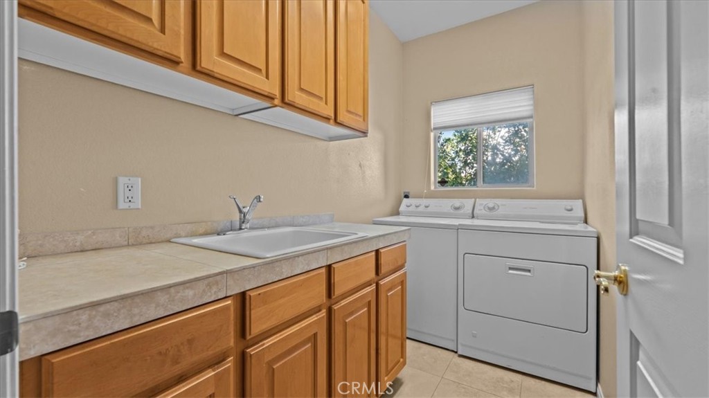 71569 Sahara Road Rancho Mirage, CA 92270 - Photo 29 of 51 Laundry Room with storage