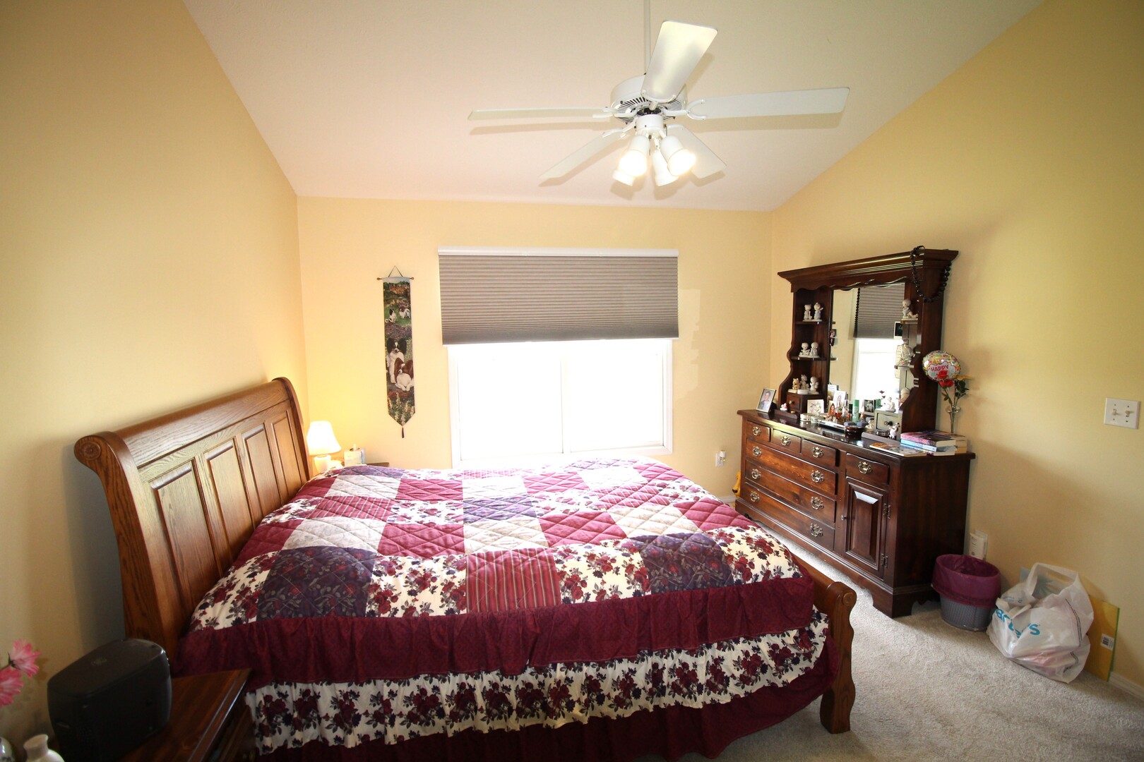 25 Oak Park Road Bloomington, IL 61701 - Photo 13 of 28 a bedroom with a bed and wooden floor