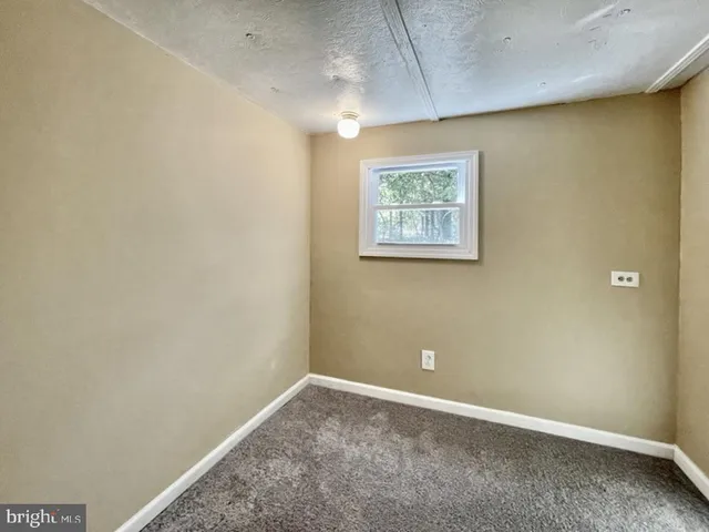 an empty room with a workbench