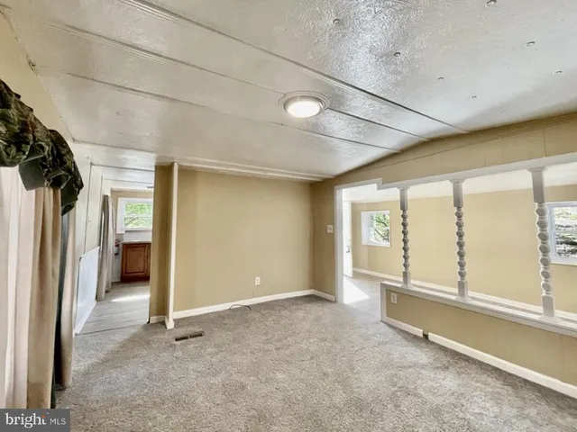 an empty room with windows