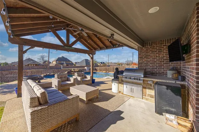 a bathroom with a granite countertop sink mirror and shower