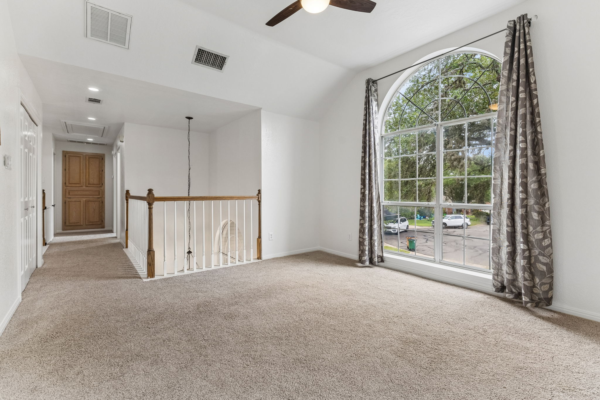 10400 O'Rourk Lane Austin, TX 78739 - Photo 21 of 33 a view of an empty room with a window
