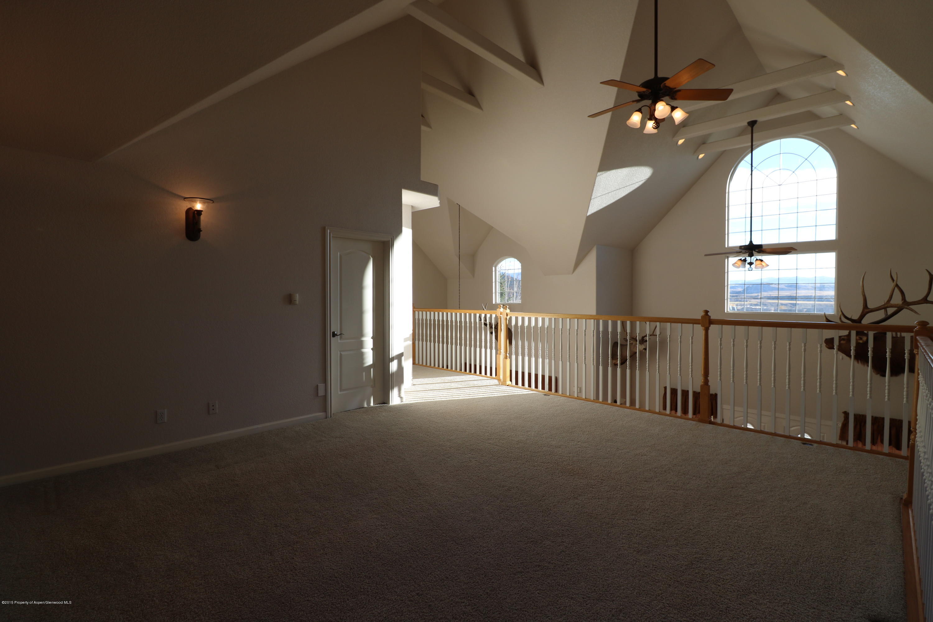 4323 Peach Valley Road Silt, CO 81652 - Photo 22 of 31 Upstairs Living Area 2