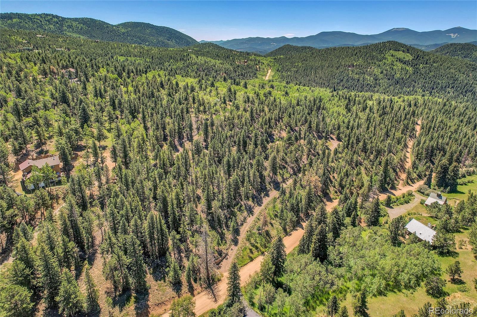 5 Hughesville Road Black Hawk, CO 80422 - Photo 7 of 17 a view of mountain view with lush green forest