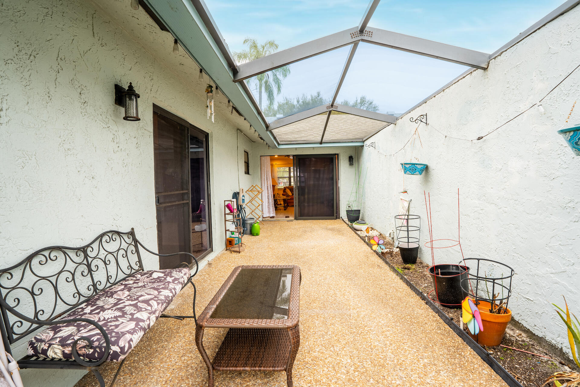 9142 Southwest 22nd Street, Unit F Boca Raton, FL 33428 - Photo 25 of 38 Primary Large Screened patio
