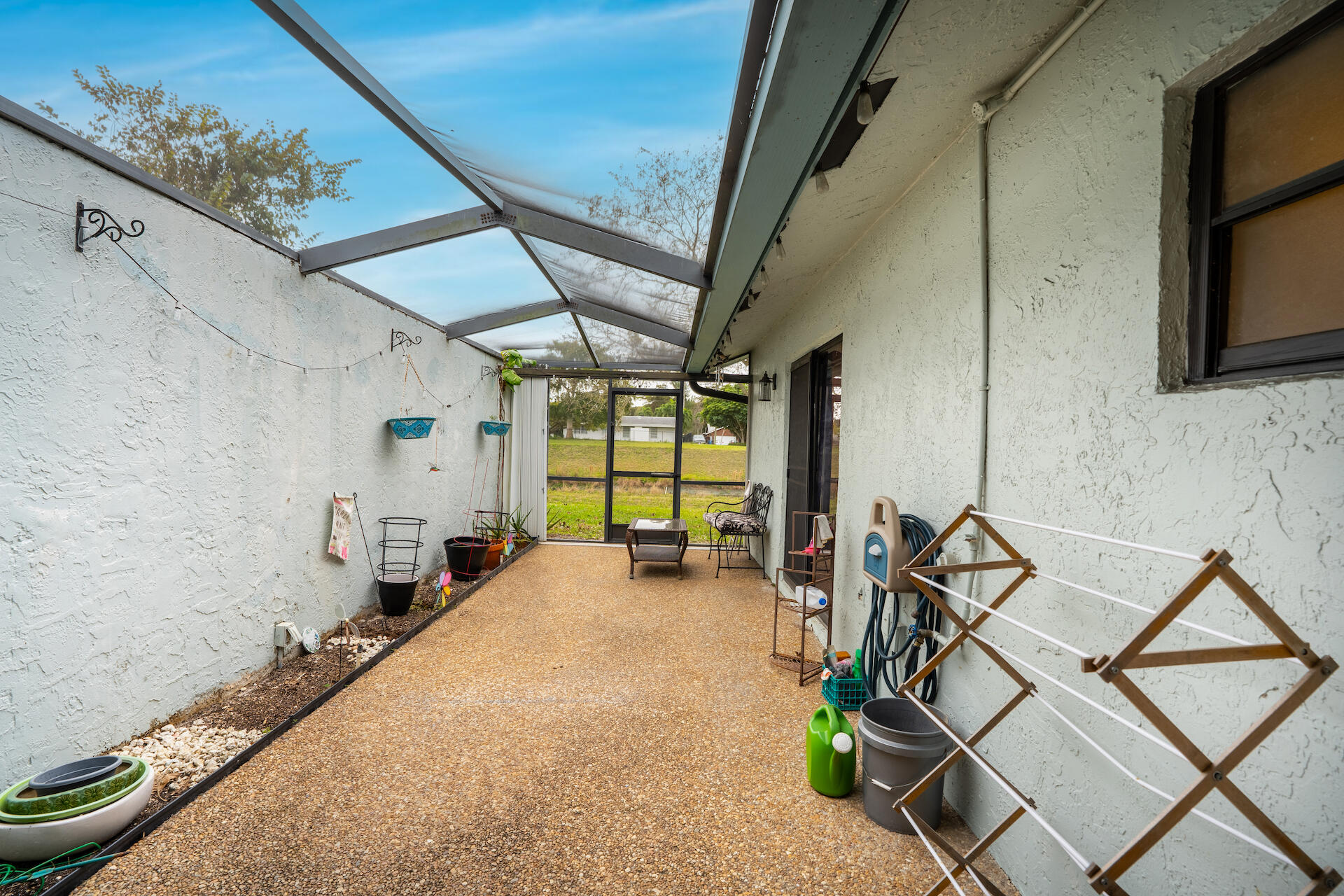 9142 Southwest 22nd Street, Unit F Boca Raton, FL 33428 - Photo 26 of 38 Primary Large Screened patio