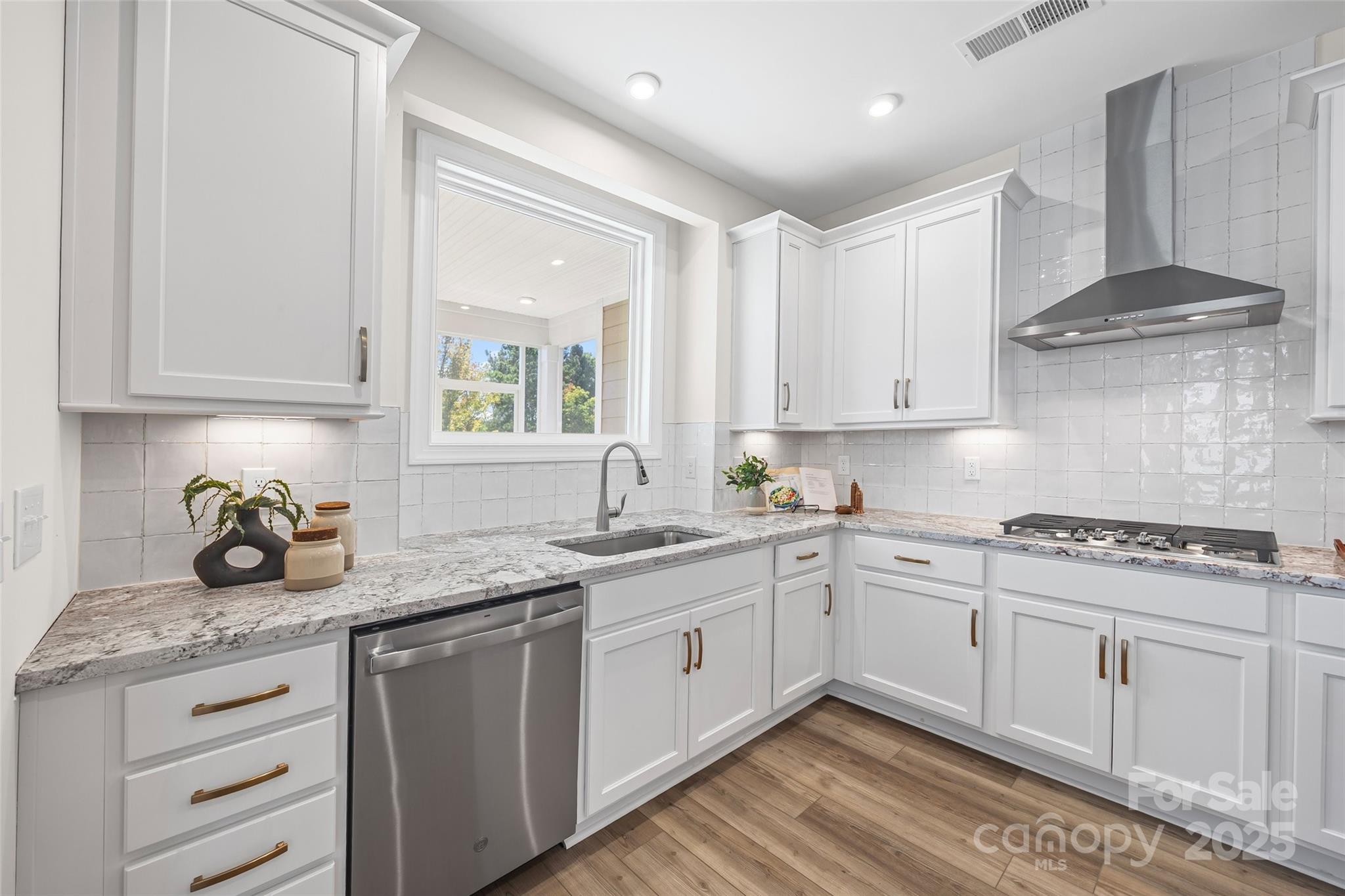 5075 Valita Road York, SC 29745 - Photo 13 of 48 a kitchen with stainless steel appliances granite countertop a sink stove and cabinets